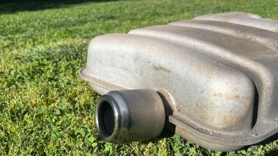 The First-Gen Mini Cooper’s Exhaust Tips Were Modeled After a Can of Budweiser