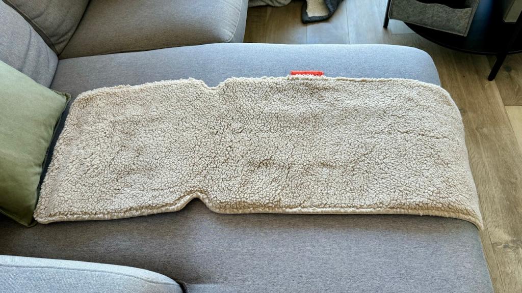 Heated throw pad on a couch