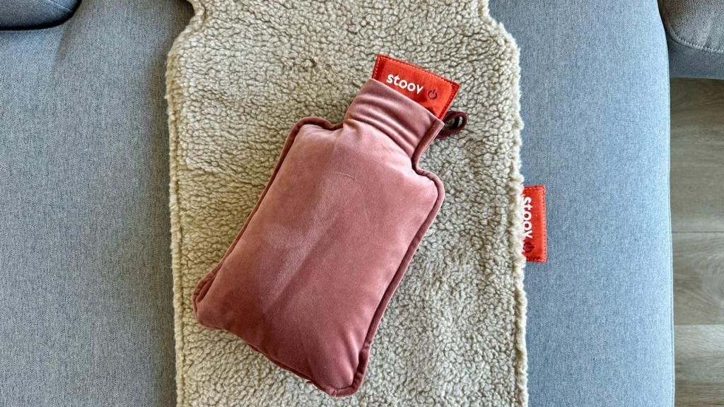 A water bottle shaped heated pillow by Stoov
