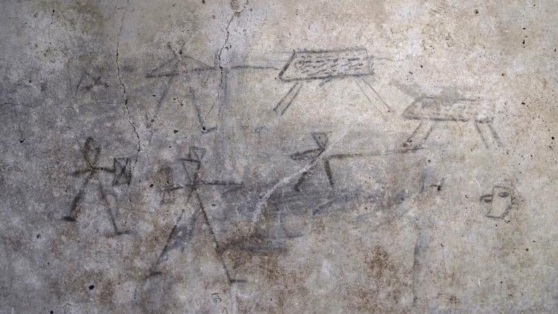 Ancient Gladiator Sketches Likely Drawn by a Child Discovered in Pompeii